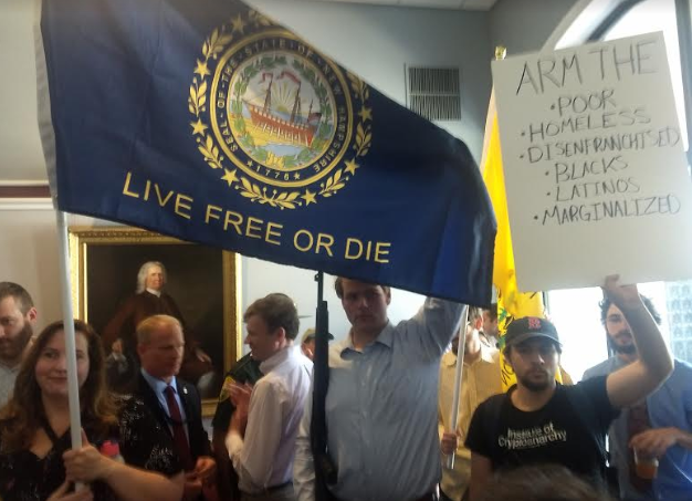 Gun right advocates show off shotgun in protest